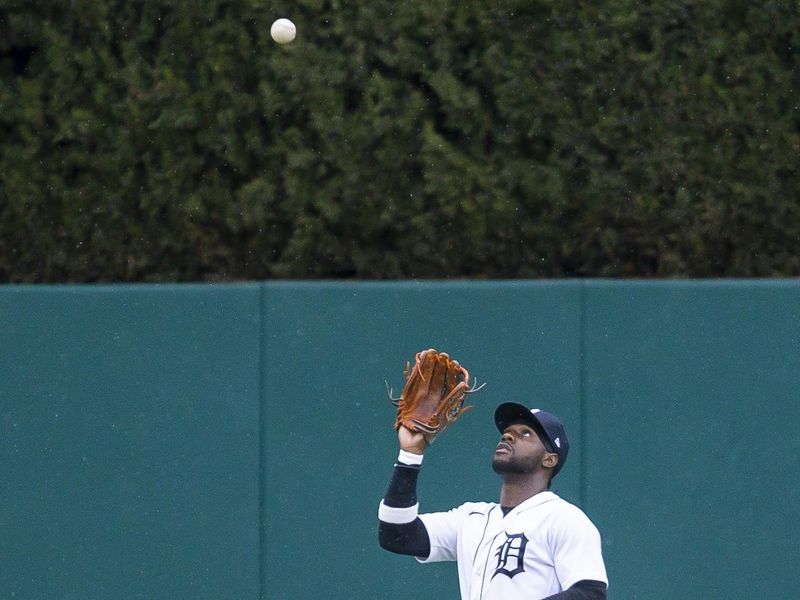 Apr 11, 2022; Detroit, Michigan, USA; Detroit Tigers center fielder Akil Baddoo (60) makes a catch for an out during the fifth inning against the Boston Red Sox at Comerica Park. Mandatory Credit: Raj Mehta-USA TODAY Sports