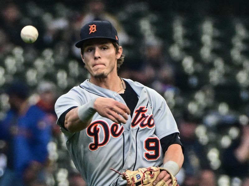 Apr 26, 2023; Milwaukee, Wisconsin, USA; Detroit Tigers third baseman Nick Maton (9) throws out Milwaukee Brewers right fielder Brian Anderson (not pictured) in the fifth inning at American Family Field. Mandatory Credit: Benny Sieu-USA TODAY Sports