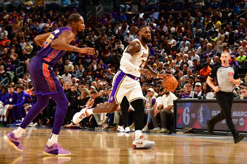 PHOENIX, AZ - FEBRUARY 25: LeBron James #23 of the Los Angeles Lakers dribbles the ball during the game against the Phoenix Suns on February 25, 2024 at Footprint Center in Phoenix, Arizona. NOTE TO USER: User expressly acknowledges and agrees that, by downloading and or using this photograph, user is consenting to the terms and conditions of the Getty Images License Agreement. Mandatory Copyright Notice: Copyright 2024 NBAE (Photo by Kate Frese/NBAE via Getty Images)