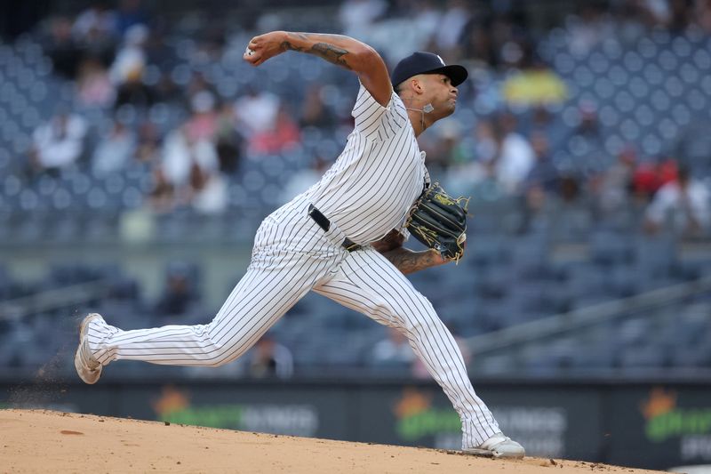 Aug 7, 2024; Bronx, New York, USA; New York Yankees starting pitcher Luis Gil (81) pitches against the Los Angeles Angels during the first inning at Yankee Stadium. Mandatory Credit: Brad Penner-USA TODAY Sports