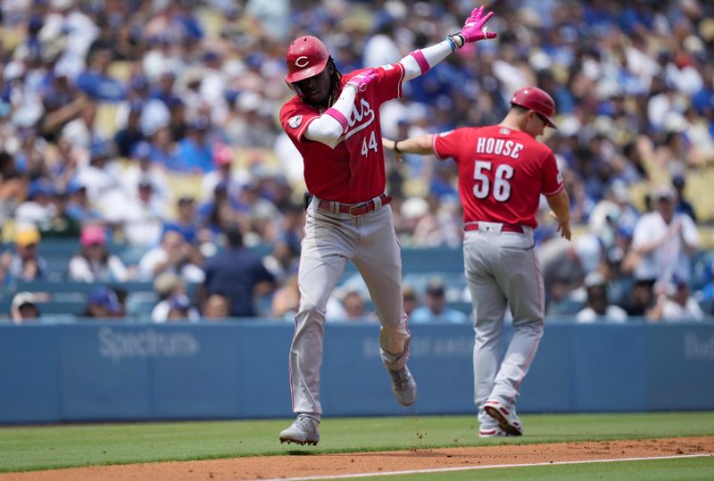 Jul 30, 2023; Los Angeles, California, USA; Cincinnati Reds third baseman Elly De La Cruz (44) is congratulated by third base coach J.R. House (56) after hitting a home run in the second inning against the Los Angeles Dodgers at Dodger Stadium. Mandatory Credit: Kirby Lee-USA TODAY Sports