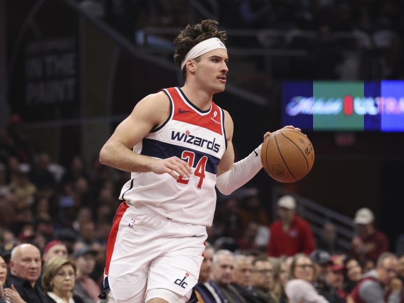 CLEVELAND, OH - DECEMBER 3: Corey Kispert #24 of the Washington Wizards drives to the basket during the game against the Cleveland Cavaliers in the NBA Cup on December 3, 2024 at Rocket Mortgage FieldHouse in Cleveland, Ohio. NOTE TO USER: User expressly acknowledges and agrees that, by downloading and/or using this Photograph, user is consenting to the terms and conditions of the Getty Images License Agreement. Mandatory Copyright Notice: Copyright 2024 NBAE (Photo by  Lauren Leigh Bacho/NBAE via Getty Images)