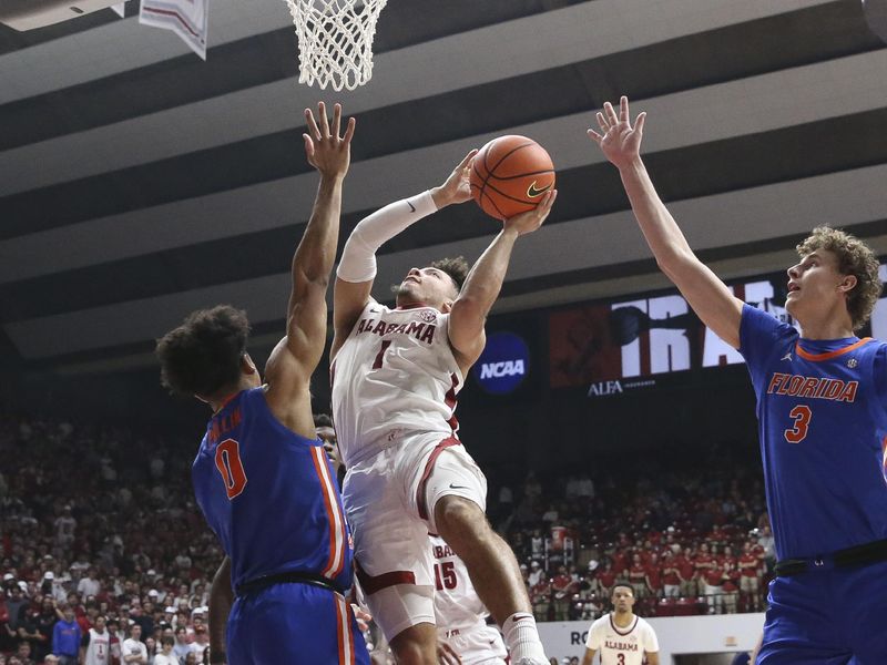 Feb 21, 2024; Tuscaloosa, Alabama, USA; Alabama Crimson Tide guard Mark Sears (1) shoots over Florida Gators forward Zyon Pullin (0) at Coleman Coliseum. Mandatory Credit: Gary Cosby Jr.-USA TODAY Sports