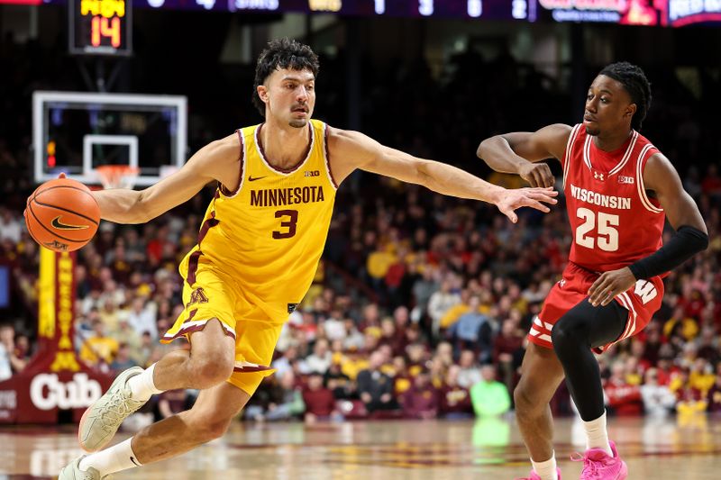 Mar 5, 2025; Minneapolis, Minnesota, USA; Minnesota Golden Gophers forward Dawson Garcia (3) works around Wisconsin Badgers guard John Blackwell (25) during the first half at Williams Arena. Mandatory Credit: Matt Krohn-Imagn Images