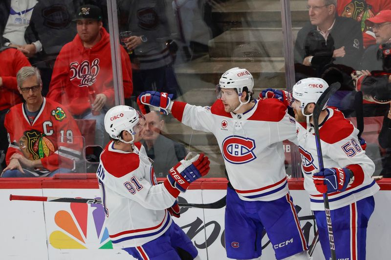 Dec 22, 2023; Chicago, Illinois, USA; Montreal Canadiens right wing Josh Anderson (17) celebrates with teammates after a goal against the Chicago Blackhawks during the second period at United Center. Mandatory Credit: Kamil Krzaczynski-USA TODAY Sports