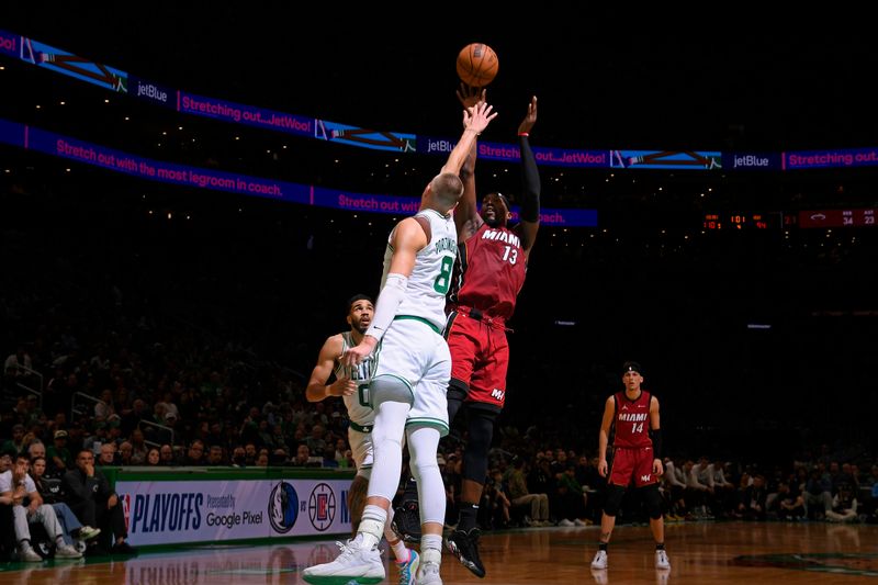 BOSTON, MA - APRIL 21: Bam Adebayo #13 of the Miami Heat shoots the ball during the game against the Boston Celtics during Round 1 Game 1 of the 2024 NBA Playoffs on April 21, 2024 at the TD Garden in Boston, Massachusetts. NOTE TO USER: User expressly acknowledges and agrees that, by downloading and or using this photograph, User is consenting to the terms and conditions of the Getty Images License Agreement. Mandatory Copyright Notice: Copyright 2024 NBAE  (Photo by Brian Babineau/NBAE via Getty Images)