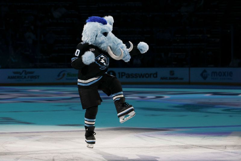 Oct 15, 2025; Salt Lake City, Utah, USA; Tusky, the new Utah Mammoth mascot is introduced to the fans before the game against the Calgary Flames at Delta Center. Mandatory Credit: Rob Gray-Imagn Images