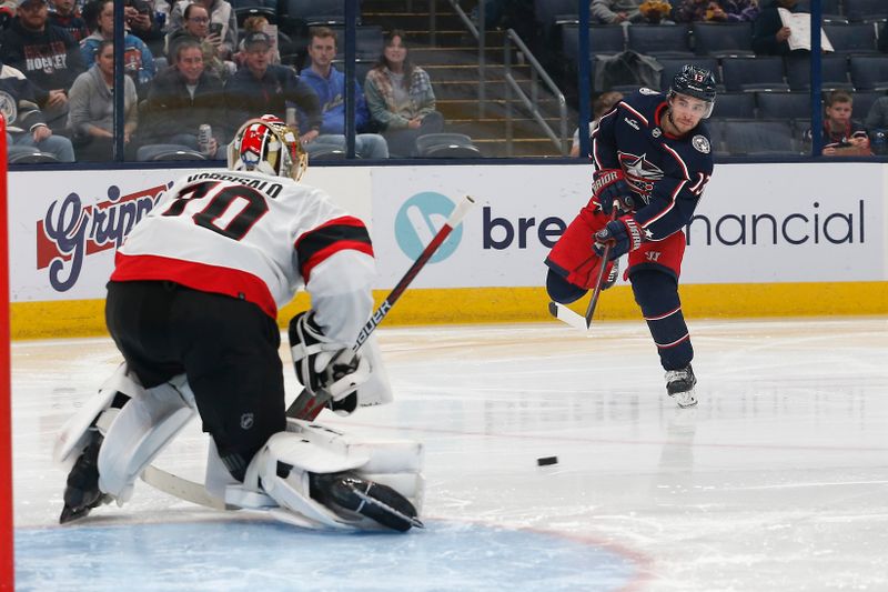 Dec 1, 2023; Columbus, Ohio, USA; Ottawa Senators goalie Joonas Korpisalo (70) makes a save on the shot from Columbus Blue Jackets left wing Johnny Gaudreau (13) during the second period at Nationwide Arena. Mandatory Credit: Russell LaBounty-USA TODAY Sports