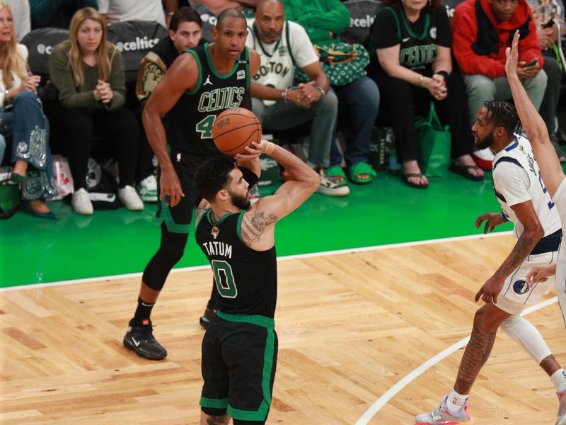 BOSTON, MA - JUNE 9: Jayson Tatum #0 of the Boston Celtics shoots a three point basket during the game  against the Dallas Mavericks during Game 2 of the 2024 NBA Finals on June 9, 2024 at the TD Garden in Boston, Massachusetts. NOTE TO USER: User expressly acknowledges and agrees that, by downloading and or using this photograph, User is consenting to the terms and conditions of the Getty Images License Agreement. Mandatory Copyright Notice: Copyright 2024 NBAE  (Photo by Chris Marion/NBAE via Getty Images)