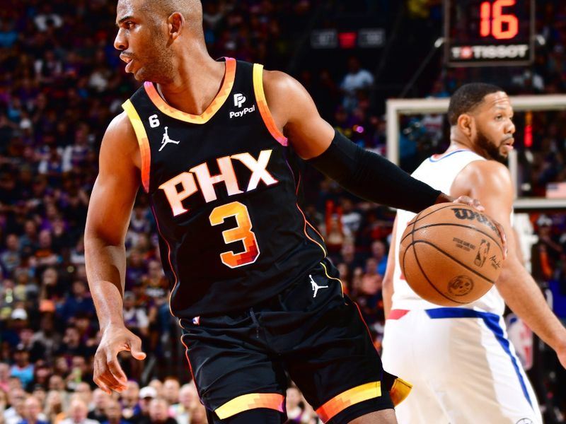 PHOENIX, AZ - APRIL 18: Chris Paul #3 of the Phoenix Suns dribbles the ball during the game against the LA Clippers during Round 1 Game 2 of the 2023 NBA Playoffs on April 18, 2023 at Footprint Center in Phoenix, Arizona. NOTE TO USER: User expressly acknowledges and agrees that, by downloading and or using this photograph, user is consenting to the terms and conditions of the Getty Images License Agreement. Mandatory Copyright Notice: Copyright 2023 NBAE (Photo by Barry Gossage/NBAE via Getty Images)