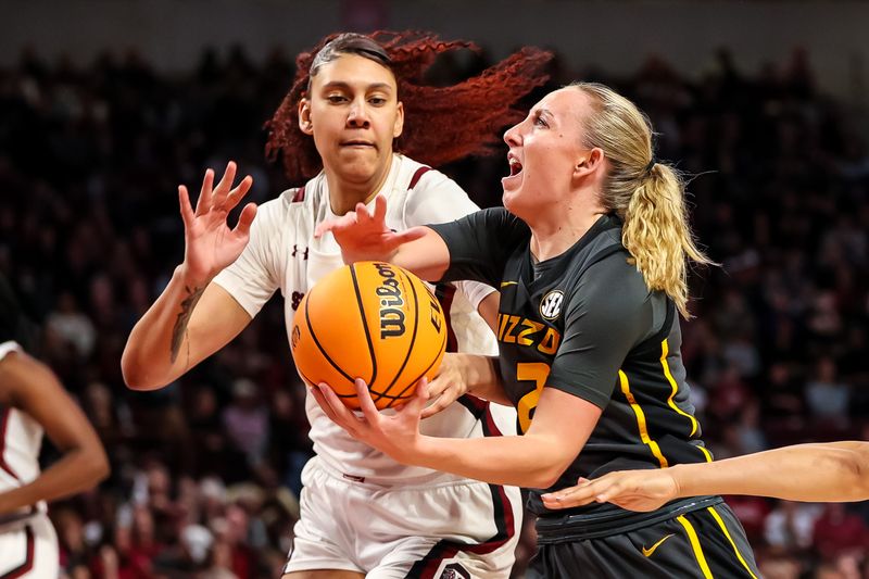 Jan 15, 2023; Columbia, South Carolina, USA; Missouri Tigers guard Sara-Rose Smith (2) drives past South Carolina Gamecocks center Kamilla Cardoso (10) in the second half at Colonial Life Arena. Mandatory Credit: Jeff Blake-USA TODAY Sports