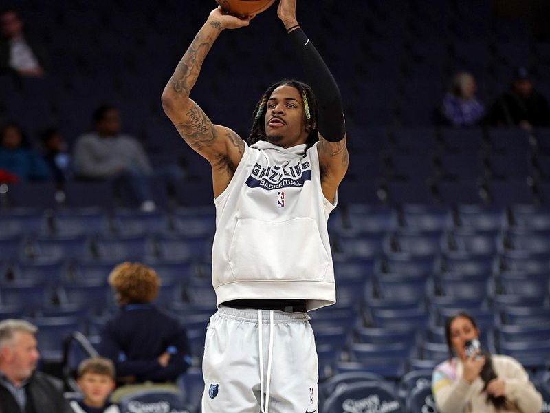 MEMPHIS, TENNESSEE - NOVEMBER 18: Ja Morant #12 of the Memphis Grizzlies warms up before the game against the Oklahoma City Thunder at FedExForum on November 18, 2022 in Memphis, Tennessee. NOTE TO USER: User expressly acknowledges and agrees that, by downloading and or using this photograph, User is consenting to the terms and conditions of the Getty Images License Agreement. (Photo by Justin Ford/Getty Images)