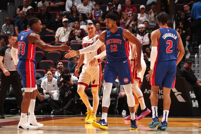 MIAMI, FL - OCTOBER 28: Tobias Harris #12 and Jaden Ivey #23 of the Detroit Pistons high five during the game against the Miami Heat on October 28, 2024 at Kaseya Center in Miami, Florida. NOTE TO USER: User expressly acknowledges and agrees that, by downloading and or using this Photograph, user is consenting to the terms and conditions of the Getty Images License Agreement. Mandatory Copyright Notice: Copyright 2024 NBAE (Photo by Issac Baldizon/NBAE via Getty Images)