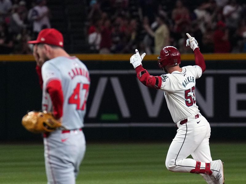 Jun 13, 2024; Phoenix, Arizona, USA; Arizona Diamondbacks first base Christian Walker (53) celebrates a solo home run against Los Angeles Angels pitcher Griffin Canning (47) during the third inning at Chase Field. Mandatory Credit: Joe Camporeale-USA TODAY Sports