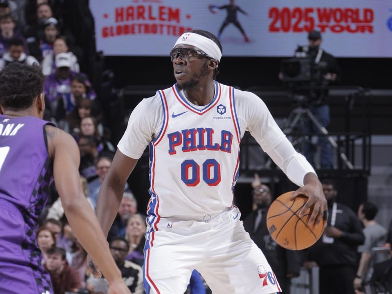 SACRAMENTO, CA - JANUARY 1:  Reggie Jackson #00 of the Philadelphia 76ers dribbles the ball during the game against the Sacramento Kings on January 1, 2025 at Golden 1 Center in Sacramento, California. NOTE TO USER: User expressly acknowledges and agrees that, by downloading and or using this Photograph, user is consenting to the terms and conditions of the Getty Images License Agreement. Mandatory Copyright Notice: Copyright 2025 NBAE (Photo by Rocky Widner/NBAE via Getty Images)