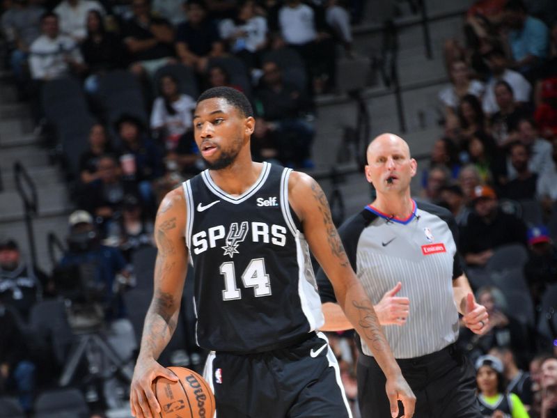 SAN ANTONIO, TX - APRIL 12: Blake Wesley #14 of the San Antonio Spurs handles the ball during the game   on April 12, 2024 at the Frost Bank Center in San Antonio, Texas. NOTE TO USER: User expressly acknowledges and agrees that, by downloading and or using this photograph, user is consenting to the terms and conditions of the Getty Images License Agreement. Mandatory Copyright Notice: Copyright 2024 NBAE (Photos by Michael Gonzales/NBAE via Getty Images)