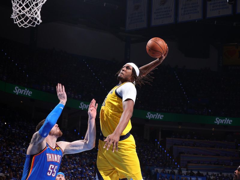 OKLAHOMA CITY, OK - JUNE 8: Myles Turner #33 of the Indiana Pacers dunks the ball during the game against the Oklahoma City Thunder during Game Two of the 2025 NBA Finals on June 8, 2025 at Paycom Center in Oklahoma City, Oklahoma. NOTE TO USER: User expressly acknowledges and agrees that, by downloading and or using this photograph, User is consenting to the terms and conditions of the Getty Images License Agreement. Mandatory Copyright Notice: Copyright 2025 NBAE(Photo by Nathaniel S. Butler/NBAE via Getty Images)
