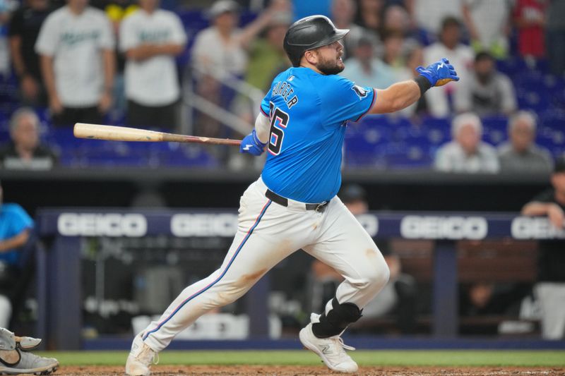 Jul 7, 2024; Miami, Florida, USA;  Miami Marlins third baseman Jake Burger (36) hits a three-run walk-off home run in the ninth inning against the Chicago White Sox at loanDepot Park. Mandatory Credit: Jim Rassol-USA TODAY Sports