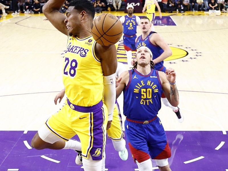 LOS ANGELES, CALIFORNIA - APRIL 25:  Rui Hachimura #28 of the Los Angeles Lakers makes a slam dunk against the Denver Nuggets in the first quarter during game three of the Western Conference First Round Playoffs at Crypto.com Arena on April 25, 2024 in Los Angeles, California.  (Photo by Ronald Martinez/Getty Images)