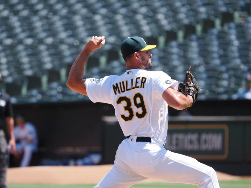 Aug 23, 2023; Oakland, California, USA; Oakland Athletics relief pitcher Kyle Muller (39) pitches the ball against the Kansas City Royals during the fifth inning at Oakland-Alameda County Coliseum. Mandatory Credit: Kelley L Cox-USA TODAY Sports