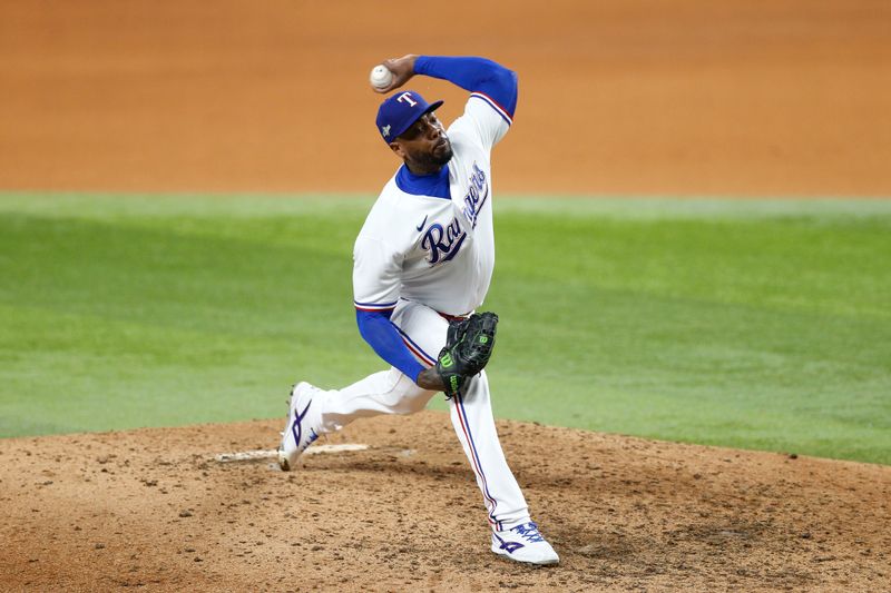 Oct 10, 2023; Arlington, Texas, USA; Texas Rangers relief pitcher Aroldis Chapman (45) pitches in the eighth inning against the Baltimore Orioles during game three of the ALDS for the 2023 MLB playoffs at Globe Life Field. Mandatory Credit: Andrew Dieb-USA TODAY Sports