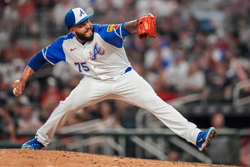 Jul 29, 2023; Cumberland, Georgia, USA; Atlanta Braves relief pitcher Daysbel Hernandez (75) pitches against the Milwaukee Brewers during the eighth inning at Truist Park. Mandatory Credit: Dale Zanine-USA TODAY Sports