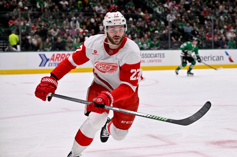 Jan 19, 2025; Dallas, Texas, USA; Detroit Red Wings center Michael Rasmussen (27) chases the puck in the Dallas Stars zone during the first period at the American Airlines Center. Mandatory Credit: Jerome Miron-Imagn Images