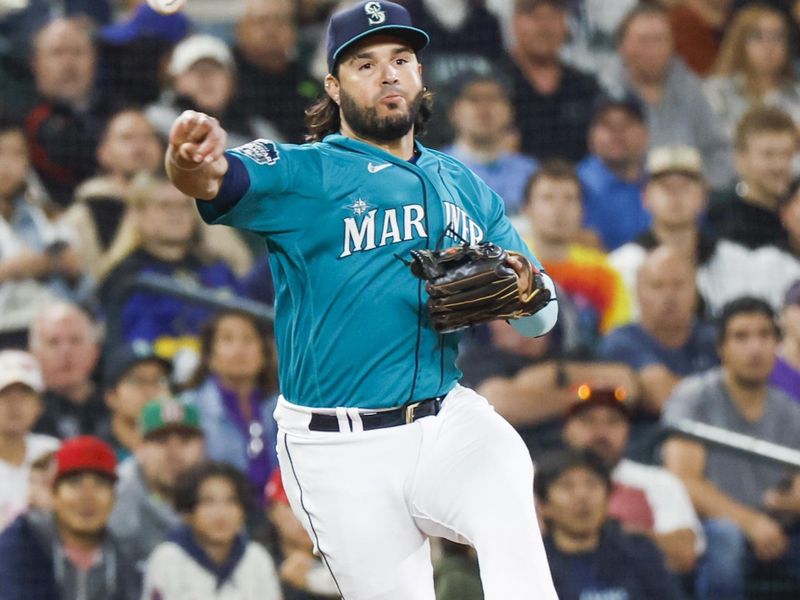 Sep 12, 2023; Seattle, Washington, USA; Seattle Mariners third baseman Eugenio Suarez (28) throws to first base for a groundout against the Los Angeles Angels during the sixth inning at T-Mobile Park. Mandatory Credit: Joe Nicholson-USA TODAY Sports