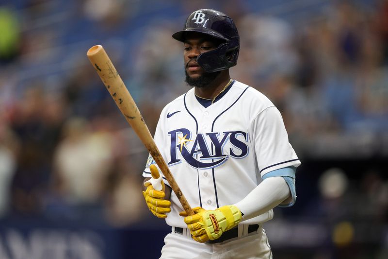 Aug 24, 2023; St. Petersburg, Florida, USA;  Tampa Bay Rays shortstop Osleivis Basabe (37) walks up to hit against the Colorado Rockies in the second inning at Tropicana Field. Mandatory Credit: Nathan Ray Seebeck-USA TODAY Sports