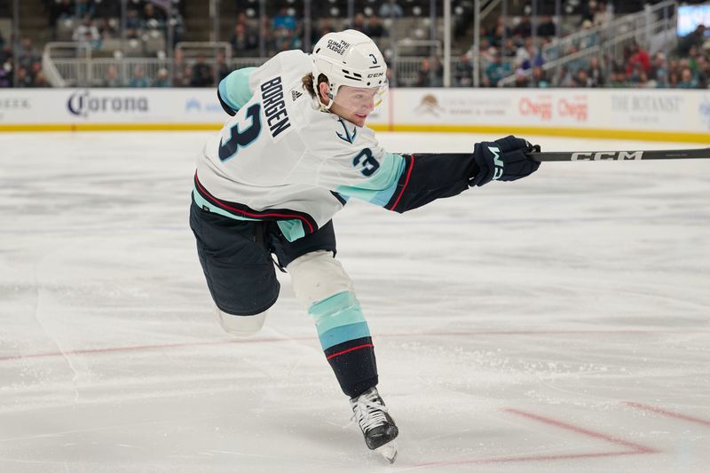 Jan 30, 2024; San Jose, California, USA; Seattle Kraken defenseman Will Borgen (3) shoots the puck against the San Jose Sharks during the first period at SAP Center at San Jose. Mandatory Credit: Robert Edwards-USA TODAY Sports