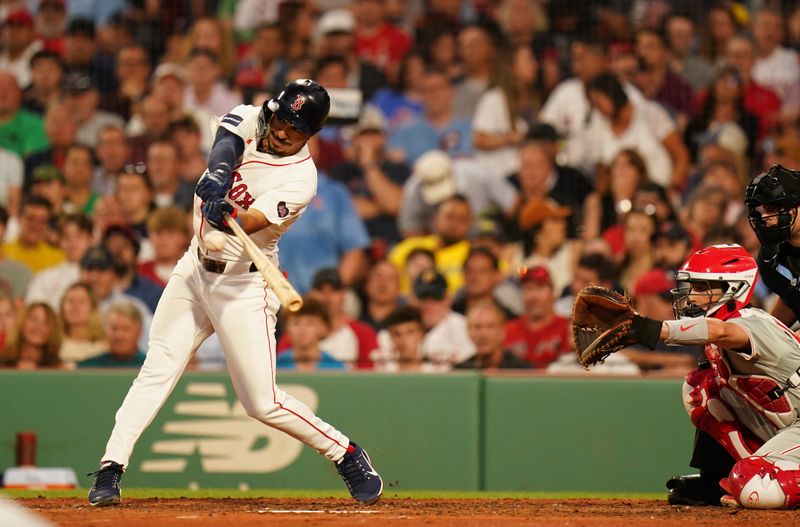 Jun 13, 2024; Boston, Massachusetts, USA; Boston Red Sox shortstop David Hamilton (70) gets a hit to drive in a run against the Philadelphia Phillies in the fourth inning at Fenway Park. Mandatory Credit: David Butler II-USA TODAY Sports