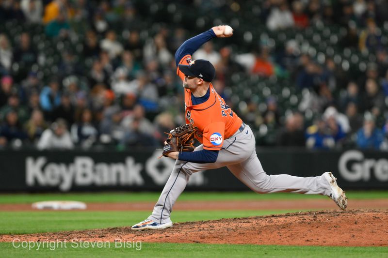 Sep 27, 2023; Seattle, Washington, USA; Houston Astros relief pitcher Ryan Pressly (55) pitches to the Seattle Mariners during the ninth inning at T-Mobile Park. Mandatory Credit: Steven Bisig-USA TODAY Sports