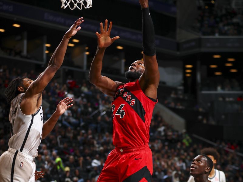 BROOKLYN, NY - OCTOBER 18: Bruno Fernando #24 of the Toronto Raptors shoots the ball during the game on October 18, 2024 at Barclays Center in Brooklyn, New York. NOTE TO USER: User expressly acknowledges and agrees that, by downloading and or using this Photograph, user is consenting to the terms and conditions of the Getty Images License Agreement. Mandatory Copyright Notice: Copyright 2024 NBAE (Photo by David L. Nemec/NBAE via Getty Images)