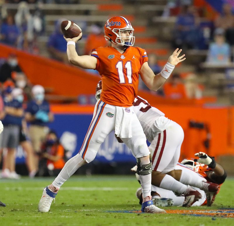 Nov 14, 2020; Gainesville, FL, USA; Florida Gators quarterback Kyle Trask (11) throws the ball during a football game against Arkansas at Ben Hill Griffin Stadium.  Mandatory Credit: Brad McClenny-USA TODAY NETWORK