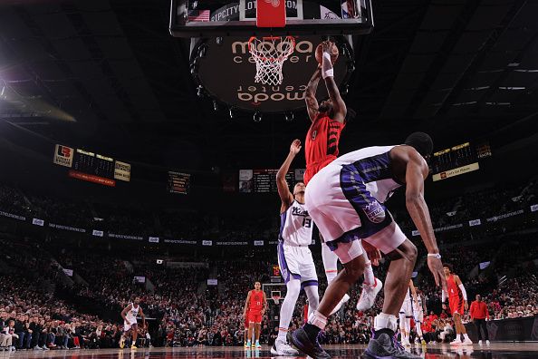 PORTLAND, OR - DECEMBER 26: Jerami Grant #9 of the Portland Trail Blazers drives to the basket during the game against the Sacramento Kings on December 26, 2023 at the Moda Center Arena in Portland, Oregon. NOTE TO USER: User expressly acknowledges and agrees that, by downloading and or using this photograph, user is consenting to the terms and conditions of the Getty Images License Agreement. Mandatory Copyright Notice: Copyright 2023 NBAE (Photo by Cameron Browne/NBAE via Getty Images)