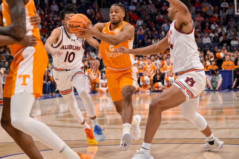 Mar 15, 2025; Nashville, TN, USA;  Tennessee Volunteers guard Chaz Lanier (2) drives to the basket against the Auburn Tigers during the first half at Bridgestone Arena. Mandatory Credit: Steve Roberts-Imagn Images