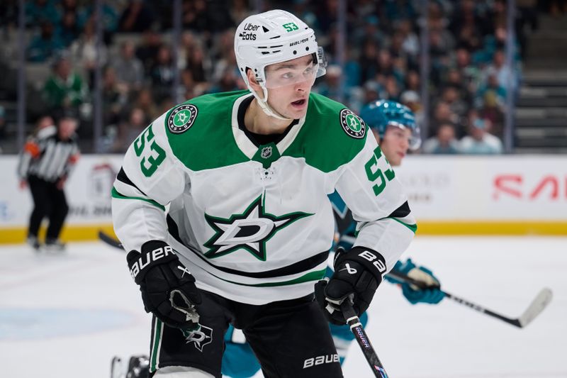 Dec 18, 2025; San Jose, California, USA; Dallas Stars center Wyatt Johnston (53) skates against San Jose Sharks left wing William Eklund (72) during the third period at SAP Center at San Jose. Mandatory Credit: Robert Edwards-Imagn Images