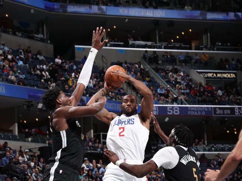 MEMPHIS, TN - FEBRUARY 23: Kawhi Leonard #2 of the LA Clippers shoots the ball during the game against the Memphis Grizzlies on February 23, 2024 at FedExForum in Memphis, Tennessee. NOTE TO USER: User expressly acknowledges and agrees that, by downloading and or using this photograph, User is consenting to the terms and conditions of the Getty Images License Agreement. Mandatory Copyright Notice: Copyright 2024 NBAE (Photo by Joe Murphy/NBAE via Getty Images)