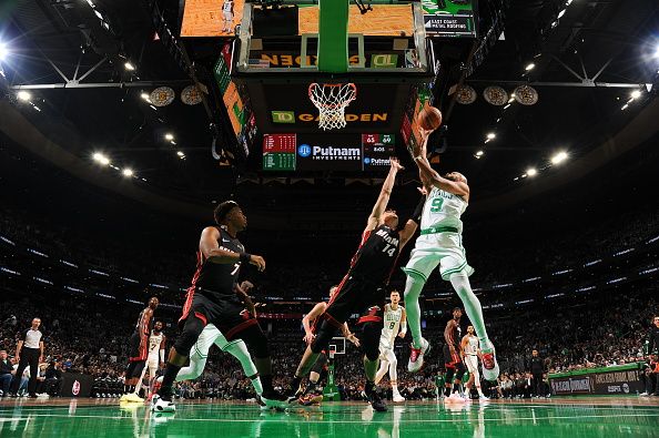 BOSTON, MA - OCTOBER 27: Derrick White #9 of the Boston Celtics drives to the basket during the game against the Miami Heat on October 27, 2023 at the TD Garden in Boston, Massachusetts. NOTE TO USER: User expressly acknowledges and agrees that, by downloading and or using this photograph, User is consenting to the terms and conditions of the Getty Images License Agreement. Mandatory Copyright Notice: Copyright 2023 NBAE  (Photo by Brian Babineau/NBAE via Getty Images)