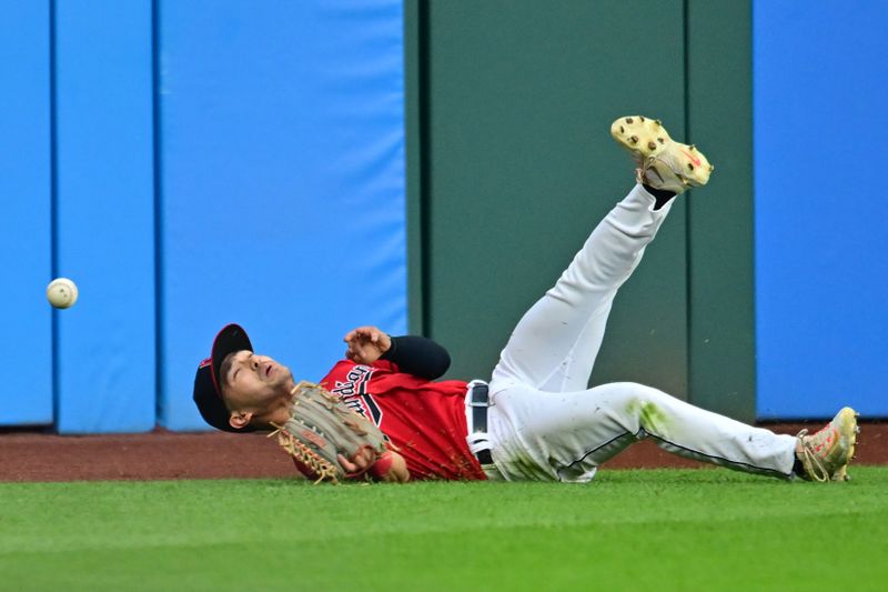 Sep 1, 2023; Cleveland, Ohio, USA; Cleveland Guardians left fielder Steven Kwan (38) cannot catch an RBI double hit by Tampa Bay Rays catcher Rene Pinto (not pictured) during the second inning at Progressive Field. Mandatory Credit: Ken Blaze-USA TODAY Sports