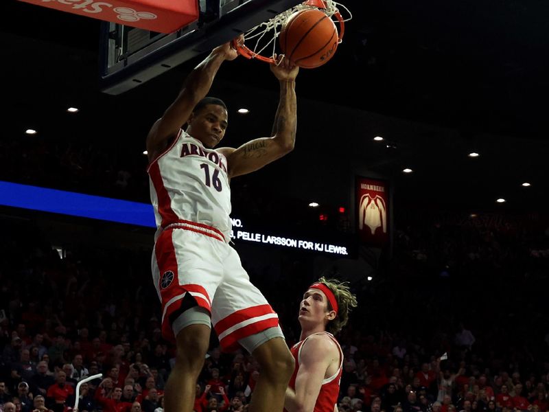 Jan 6, 2024; Tucson, Arizona, USA; Arizona Wildcats forward Keshad Johnson (16) makes a basket against Utah Utes center Branden Carlson (35) during the second half at McKale Center. Mandatory Credit: Zachary BonDurant-USA TODAY Sports