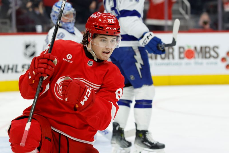 Jan 25, 2025; Detroit, Michigan, USA;  Detroit Red Wings center Marco Kasper (92) celebrates after scoring in the second period against the Tampa Bay Lightning at Little Caesars Arena. Mandatory Credit: Rick Osentoski-Imagn Images