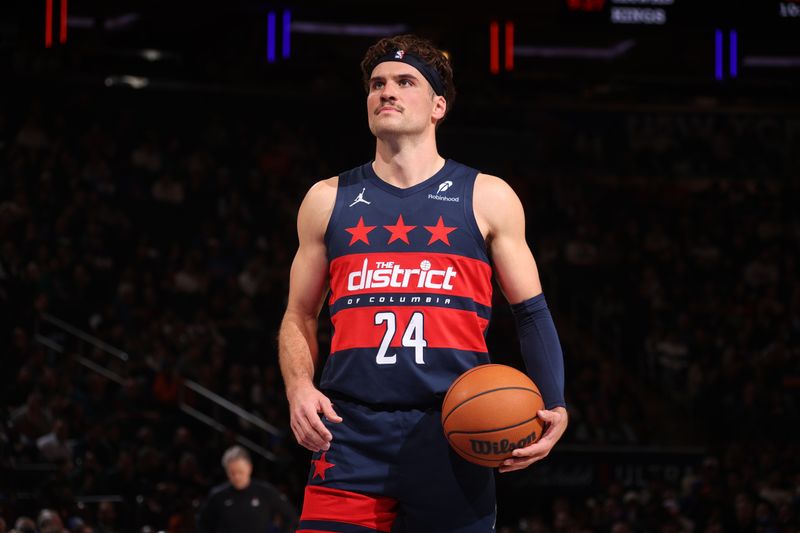 NEW YORK, NY - NOVEMBER 18: Corey Kispert #24 of the Washington Wizards prepares to shoot a free throw during the game against the New York Knicks on November 18, 2024 at Madison Square Garden in New York City, New York.  NOTE TO USER: User expressly acknowledges and agrees that, by downloading and or using this photograph, User is consenting to the terms and conditions of the Getty Images License Agreement. Mandatory Copyright Notice: Copyright 2024 NBAE  (Photo by Nathaniel S. Butler/NBAE via Getty Images)