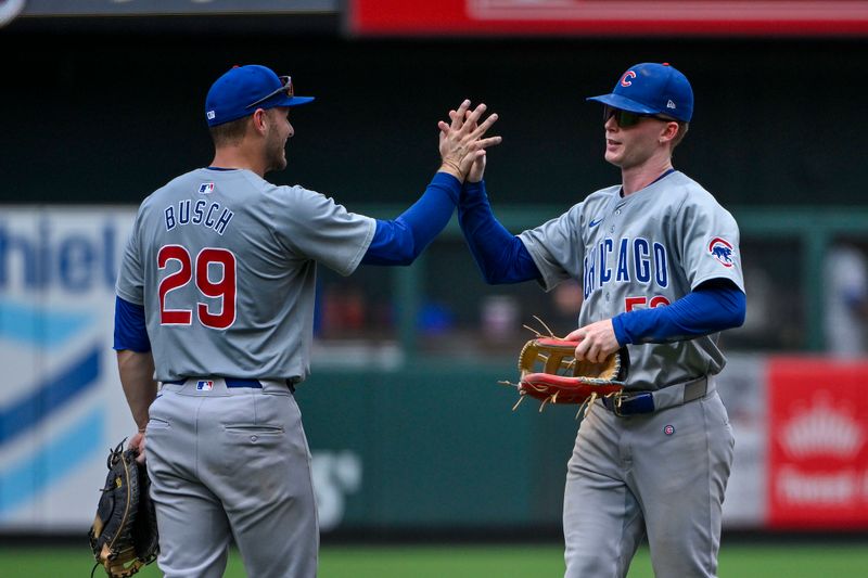 Jul 14, 2024; St. Louis, Missouri, USA;  Chicago Cubs center fielder Pete Crow-Armstrong (52) celebrates with first baseman Michael Busch (29) after the Cubs defeated the St. Louis Cardinals at Busch Stadium. Mandatory Credit: Jeff Curry-USA TODAY Sports