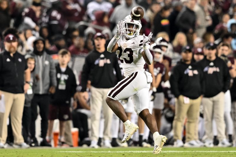 Nov 11, 2023; College Station, Texas, USA; Mississippi State Bulldogs running back Seth Davis (23) catches a pass during the fourth quarter against the Texas A&M Aggies at Kyle Field. Mandatory Credit: Maria Lysaker-USA TODAY Sports