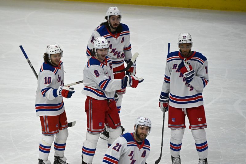 Dec 18, 2022; Chicago, Illinois, USA; New York Rangers defenseman Jacob Trouba (8) celebrates his goal against the Chicago Blackhawks during second period at the United Center. Mandatory Credit: Matt Marton-USA TODAY Sports