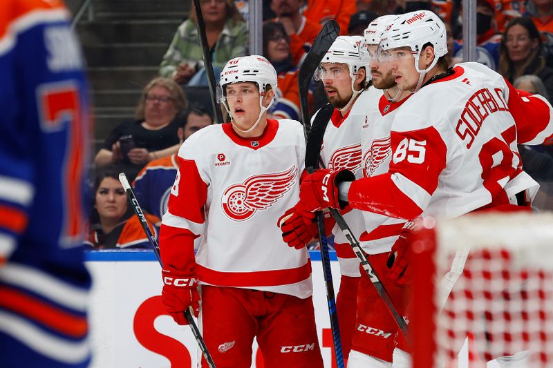 Jan 30, 2025; Edmonton, Alberta, CAN; The Detroit Red Wings celebrate a goal scored by  forward Michael Rasmussen (27) during the second period against the Edmonton Oilers at Rogers Place. Mandatory Credit: Perry Nelson-Imagn Images