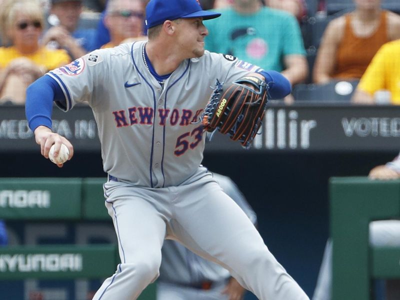 Jul 8, 2024; Pittsburgh, Pennsylvania, USA;  New York Mets relief pitcher Eric Orze (53) throws a pitch in his major league debut during the sixth inning against the Pittsburgh Pirates at PNC Park. The Pirates won 8-2. Mandatory Credit: Charles LeClaire-USA TODAY Sports