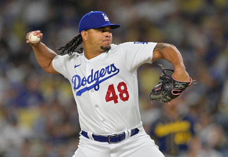 Aug 16, 2023; Los Angeles, California, USA;  Los Angeles Dodgers relief pitcher Brusdar Graterol (48) throws to the plate in the sixth inning against the Milwaukee Brewers at Dodger Stadium. Mandatory Credit: Jayne Kamin-Oncea-USA TODAY Sports