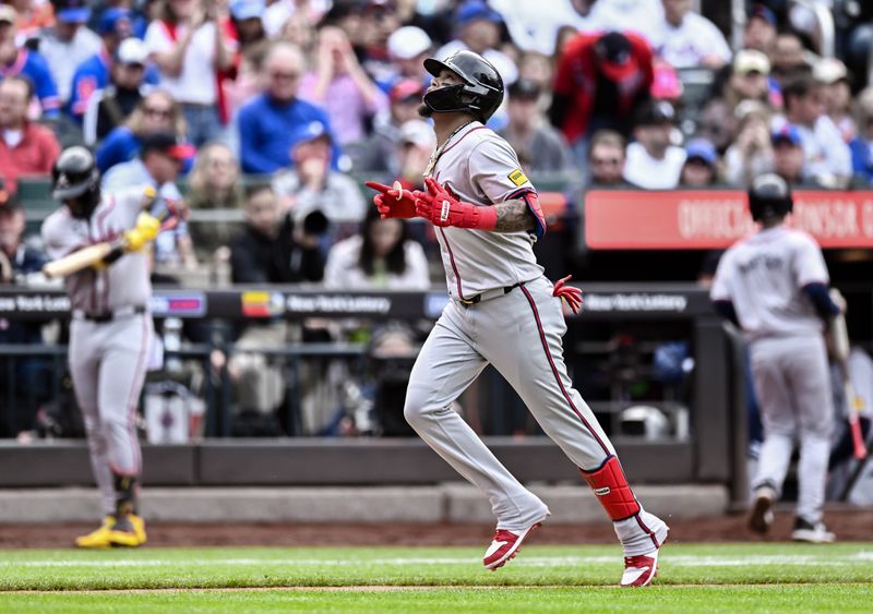 May 11, 2024; New York City, New York, USA; Atlanta Braves shortstop Orlando Arcia (11) rounds the bases after hitting a two run home run against the New York Mets during the third inning at Citi Field. Mandatory Credit: John Jones-USA TODAY Sports